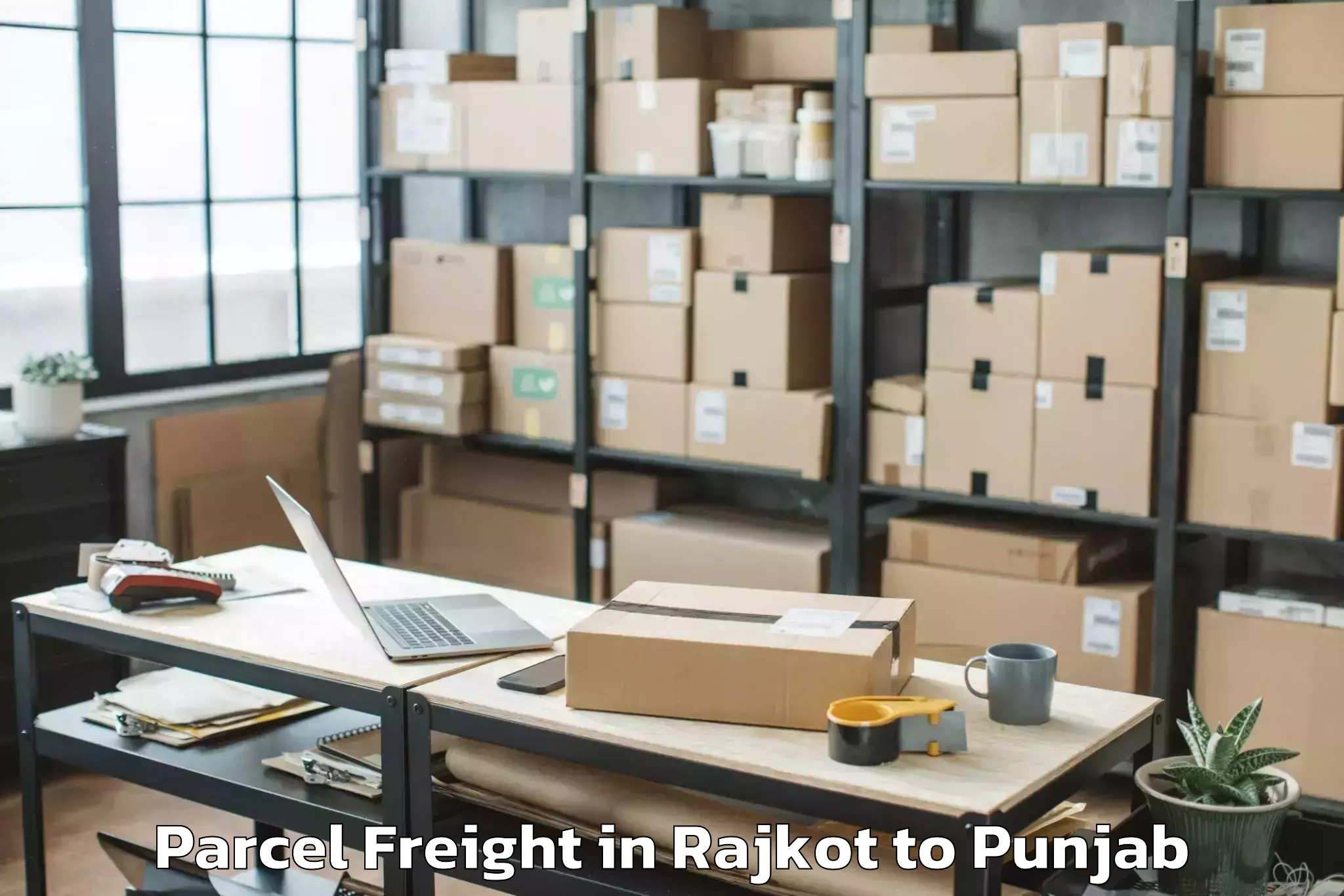 Easy Rajkot to Adampur Parcel Freight Booking